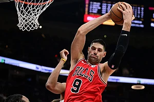 | Photo: AP/David Dermer : Chicago Bulls center Nikola Vucevic rebounds in the second half of an NBA basketball game against the Cleveland Cavaliers in Cleveland.