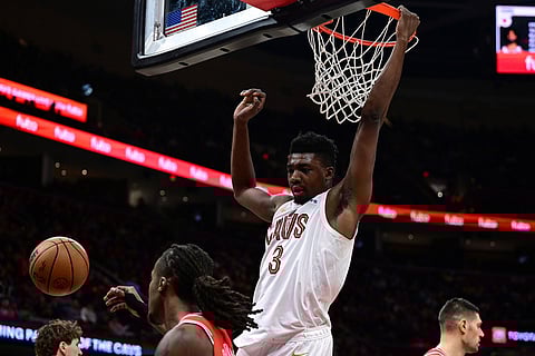 Cleveland Cavaliers center Thomas Bryant (3) dunks in the second half of an NBA basketball game against the Chicago Bulls in Cleveland.