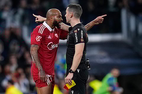 Referee Alejandro Muñiz Ruiz, shows a second yellow cards to Sevilla's Marcao who is then sent off during the Spanish La Liga soccer match between Real Madrid and Sevilla in Madrid, Spain.