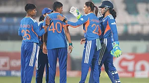 | Photo: X/BCCIWomen : India Women's Kranti Goud celebrates with teammates after a run-out during the first T20I match against Sri Lanka Women on December 21, 2025.