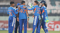 | Photo: X/BCCIWomen : India Women's Kranti Goud celebrates with teammates after a run-out during the first T20I match against Sri Lanka Women on December 21, 2025.