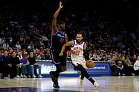 New York Knicks Vs Miami Heat, NBA 2025: Jalen Brunson’s 47 Powers Knicks Past Heat | Photo: AP/John Munson : New York Knicks guard Jalen Brunson (11) dribbles around Miami Heat center Bam Adubayo (13) during the first half of an NBA basketball game in New York.
