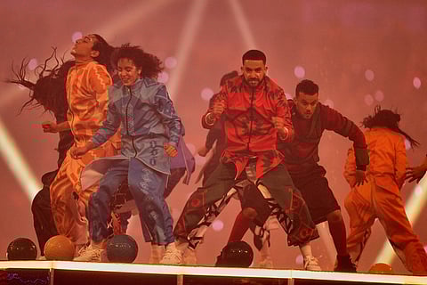 Performers take part in the opening ceremony of the Africa Cup of Nations and the opening group A soccer match between Morocco and Comoros in Rabat, Morocco.