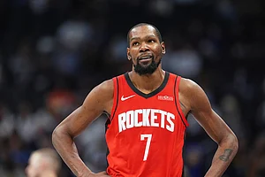 | Photo: AP/David Zalubowski : Houston Rockets forward Kevin Durant heads to the bench late in an NBA basketball game against the Denver Nuggets in Denver.