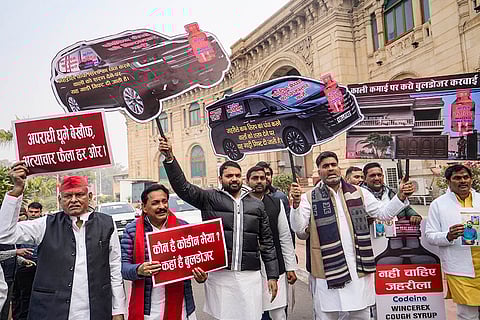 Samajwadi Party MLAs stage a protest over Codeine cough syrup case during the Winter session of Uttar Pradesh Assembly, in Lucknow.