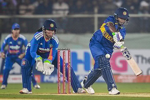 Sri Lanka's Harshitha Samarawickrama plays a shot during the first Women's T20I cricket match between India and Sri Lanka, in Visakhapatnam, Andhra Pradesh.