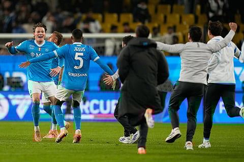 Napoli's Scott McTominay, left, teammate Napoli's Juan Jesus celebrate at the end of the Italian Super Cup final soccer match between Napoli and Bologna in Riyadh, Saudi Arabia.