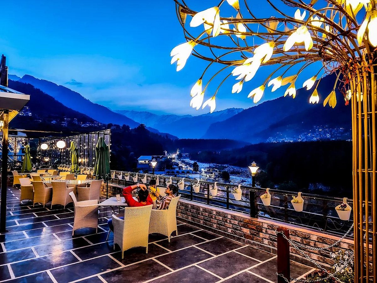 Manali resort outdoor dining mountain view