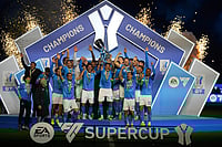 Napoli 2-0 Bologna, Supercoppa Italiana: David Neres' Brace Sees Antonio Conte Scoop First Silverware | Photo: AP/Altaf Qadri : Napoli's players celebrate with the trophy at the end of the Italian Super Cup final soccer match between Napoli and Bologna in Riyadh, Saudi Arabia.
