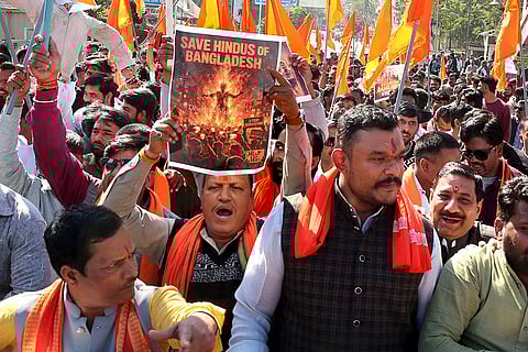 Bajrang Dal and Vishwa Hindu Parishad (VHP) activists stage a protest against the alleged atrocities on minority Hindus in Bangladesh, in Bhopal.