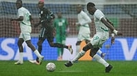 AP/Mosa'ab Elshamy : Senegal's Moussa Niakhate passes the ball during the Africa Cup of Nations group D soccer match between Senegal and Botswana in Tangier.