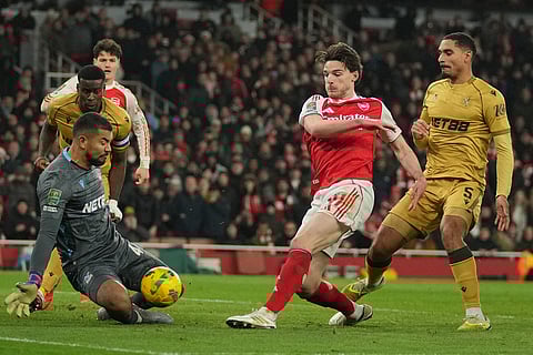Crystal Palace's goalkeeper Walter Benitez saves shot by Arsenal's Declan Rice during the English Football League Cup quarter-final soccer match between Arsenal and Crystal Palace in London.