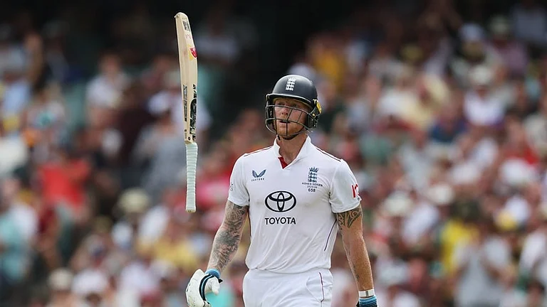 England's Ben Stokes throws his bat as he reacts after he was out bowled during play on day three of the third Ashes cricket test between England and Australia in Adelaide, Australia. - | Photo: AP/James Elsby