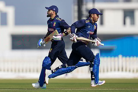 Delhi's Virat Kohli and Nitish Rana run between the wickets during the Vijay Hazare Trophy 2025-26 cricket match between Andhra and Delhi, at BCCI Centre of Excellence Ground, in Bengaluru.