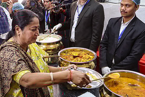 Delhi Chief Minister Rekha Gupta has a meal during the inauguration of an 'Atal Canteen' on the birth anniversary of former prime minister Atal Bihari Vajpayee, in New Delhi. The Delhi government on Thursday launched 100 Rs 5-per-meal Atal canteens.