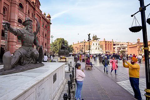 People visit the Heritage Street, near the Golden Temple in Amritsar. The sale of meat, tobacco, alcohol, other intoxicants are now prohibited in Amritsar Walled City, Talwandi Sabo and Sri Anandpur Sahib after a notification was issued by the Punjab government, according them 'holy city' status.