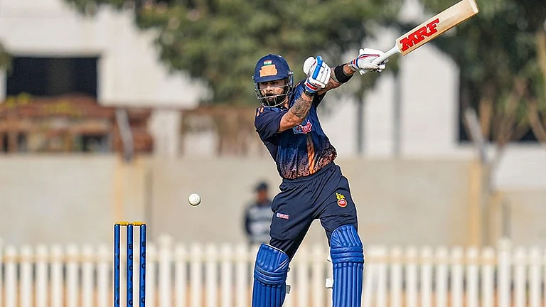 Delhi's Virat Kohli plays a shot during the Vijay Hazare Trophy 2025-26 cricket match between Andhra and Delhi, at BCCI Centre of Excellence Ground, in Bengaluru. - Photo: PTI/Shailendra Bhojak