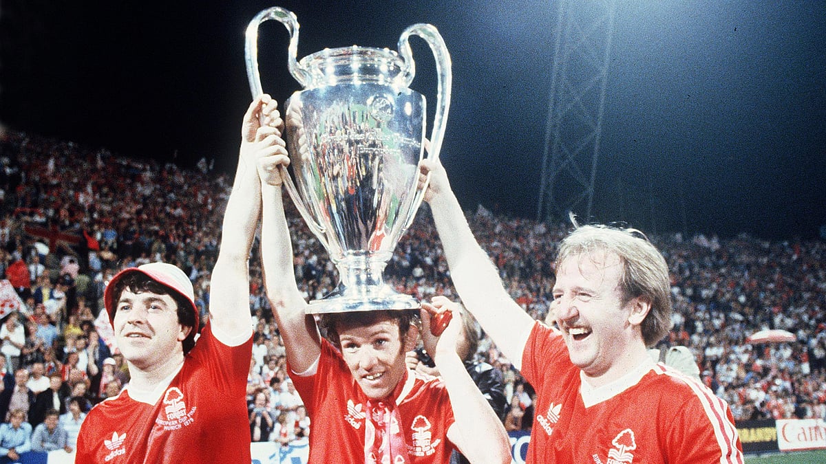 Nottingham Forest's John Robertson, left, Ian Bowyer, center, and Kenny Burns, right, carry the European Cup in triumph after their 1-0 win against Malmo FF in Munich, Germany, May 30, 1979.  - (AP Photo, File)