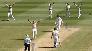 (AP Photo/Hamish Blair) : Australia's Scott Boland, second left, along with teammates, successfully appeal for a LBW decision on England's Harry Brook, third right, during their Ashes cricket test match in Melbourne, Friday, Dec. 26, 2025.