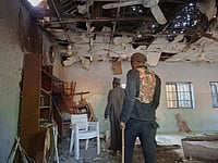 Bomb Blast In Nigeria's Maiduguri Mosque Kills Five AP Photo/Jossy Ola : People inspect the scene of a deadly bomb explosion inside a mosque in Maiduguri, Nigeria, Thursday, Dec. 25, 2025.