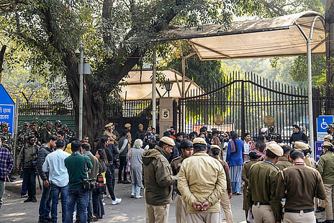 Security personnel keep vigil during a demonstration against the suspension of the jail term of Kuldeep Sengar, a former BJP MLA who was convicted in the Unnao rape case, outside the Delhi High Court, in New Delhi.