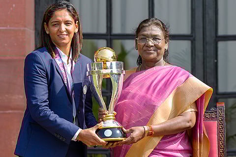 President Droupadi Murmu with women's cricket team captain Harmanpreet Kaur during a meeting following the team's victory in the ODI World Cup, at Rashtrapati Bhavan, in New Delhi, Thursday, Nov. 6, 2025. 