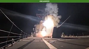 X : Screengrab of a video released by US Department of War