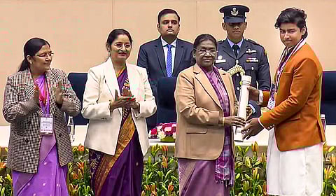 President Droupadi Murmu confers the 'Pradhan Mantri Rashtriya Bal Puraskar' on cricketer Vaibhav Suryavanshi during a ceremony on the occasion of 'Veer Bal Diwas', in New Delhi. 