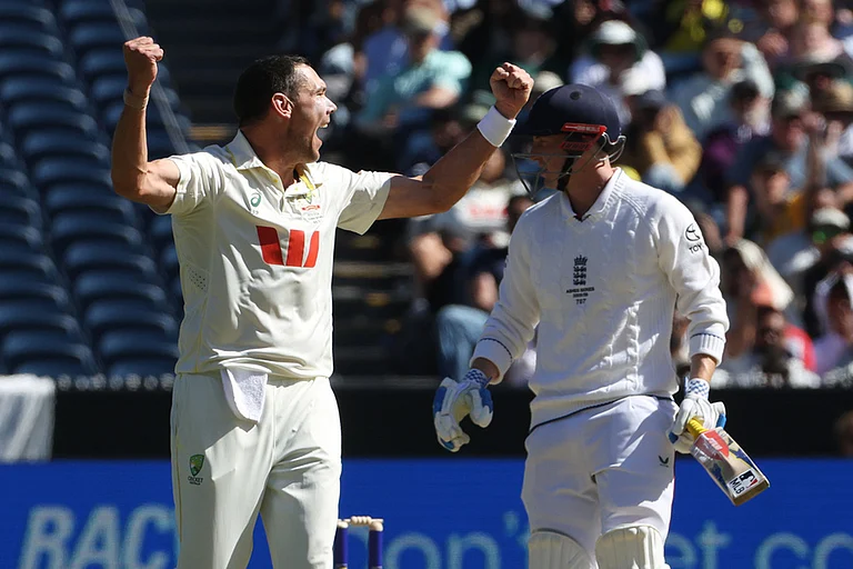 Australia's Scott Boland, left, successfully appeals for a LBW on England's Harry Brook, right, during their Ashes cricket test match in Melbourne. - | Photo: AP/Hamish Blair