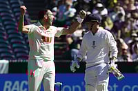 | Photo: AP/Hamish Blair : Australia's Scott Boland, left, successfully appeals for a LBW on England's Harry Brook, right, during their Ashes cricket test match in Melbourne. 