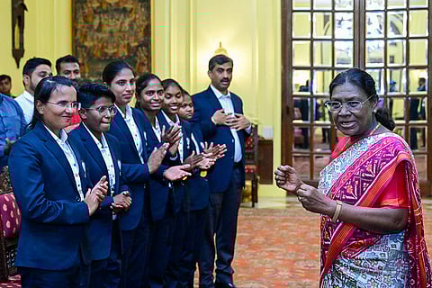 In this image posted on Nov. 29, 2025, President Droupadi Murmu during an interaction with members of the Indian women's blind cricket team that won the inaugural Women's T20 World Cup for the Blind, at Rashtrapati Bhavan, in New Delhi. 