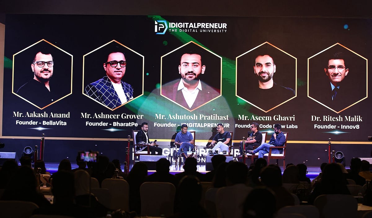 Panel of five business founders at an IDIGITALPRENEUR event on a stage.