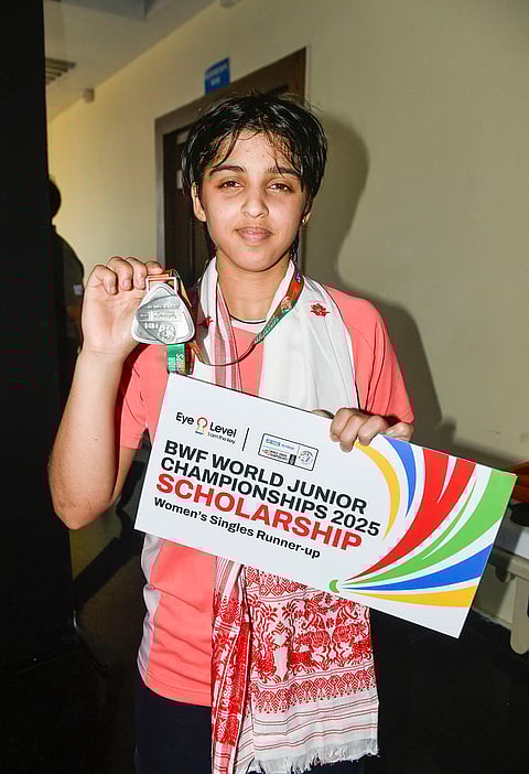 India’s Tanvi Sharma after winning silver medal in women’s singles category at the BWF World Junior Championships, at National Centre of Excellence, in Guwahati, Assam, Sunday, Oct. 19, 2025. 