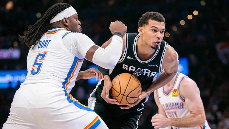 The San Antonio Spurs extended their winning streak to eight games with a 117-102 victory over the Oklahoma City Thunder on Christmas - their third win in less than two weeks against the defending NBA champions. - null