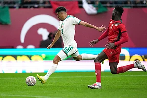 | Photo: AP/Mosa'ab Elshamy : Algeria's Baghdad Bounedjah attempts a shot next to Sudan's Mohamed Saeed Ahmed during the Africa Cup of Nations group E soccer match between Algeria and Sudan in Rabat, Morocco.