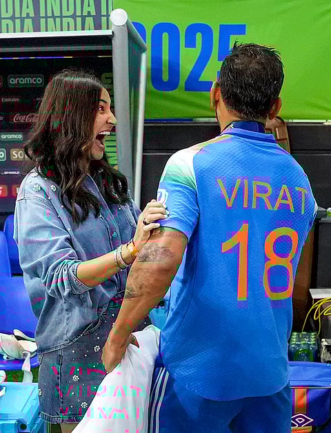 Indian cricket team's Virat Kohli celebrates with his wife Anushka Sharma after India won against New Zealand in the ICC Champions Trophy 2025 final cricket match, in Dubai, UAE, Sunday, March 9, 2025. India won by 4 wickets to lift the ICC Champions Trophy 2025. 
