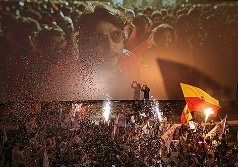 Fans of jailed Kannada actor Darshan Thoogudeepa celebrate the release of his new film 'The Devil', at a theatre in Bengaluru, Thursday, Dec. 11, 2025. The actor is currently lodged in Ballari Central Prison in connection with the Renukaswamy murder case.