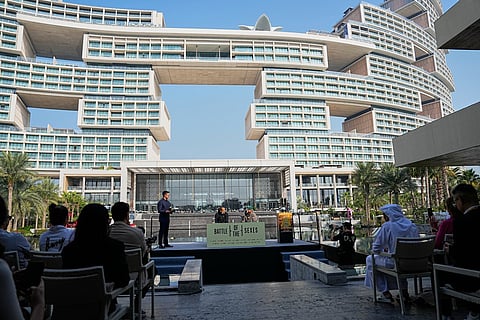 Tennis players Aryna Sabalenka of Belarus, center left, and Nick Kyrgios of Australia, center right, speak during a press conference ahead of the Battle of the Sexes exhibition match at Atlantis The Royal in Dubai, United Arab Emirates.
