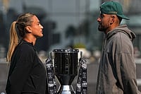 Aryna Sabalenka Faces Nick Kyrgios In Controversial 'Battle Of The Sexes' Sequel | Photo: AP/Fatima Shbair : Tennis players Aryna Sabalenka of Belarus, left, and Nick Kyrgios of Australia face-off with the trophy during a press conference ahead of the Battle of the Sexes exhibition match at Atlantis The Royal in Dubai, United Arab Emirates.