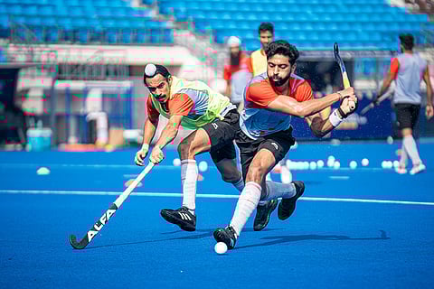 In the thick of action, Dilraj Singh and Shamsher Singh during a practice game.
