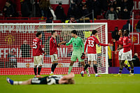 English Premier League: Patrick Dorgu's Sole Effort Helps Manchester United Edge Past Newcastle United At Old Trafford | Photo: AP/Dave Thompson : Manchester United players celebrate after their win, during the English Premier League soccer match between Manchester United and Newcastle in Manchester, England.