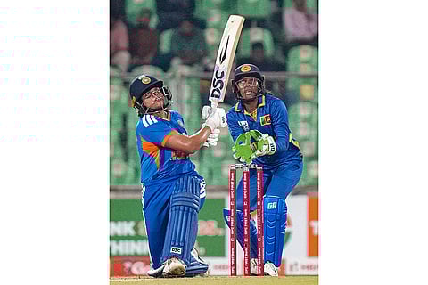 India's Shafali Verma plays a shot during the third T20 International cricket match of a series between India Women and Sri Lanka Women, at Greenfield International Stadium, in Thiruvananthapuram, Kerala.