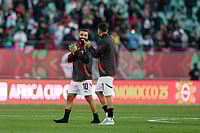 | Photo: AP/Themba Hadebe : Egypt's Mohamed Salah and Egypt's Trézéguet celebrate after winning the Africa Cup of Nations group B soccer match between Egypt and South Africa in Agadir, Morocco.