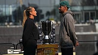 Aryna Sabalenka Vs Nick Kyrgios: Indian AI Startup KPro To Power ‘Battle Of The Sexes’ In Dubai | Photo: AP/Fatima Shbair : Tennis players Aryna Sabalenka of Belarus, left, and Nick Kyrgios of Australia face-off with the trophy during a press conference ahead of the Battle of the Sexes exhibition match at Atlantis The Royal in Dubai, United Arab Emirates.