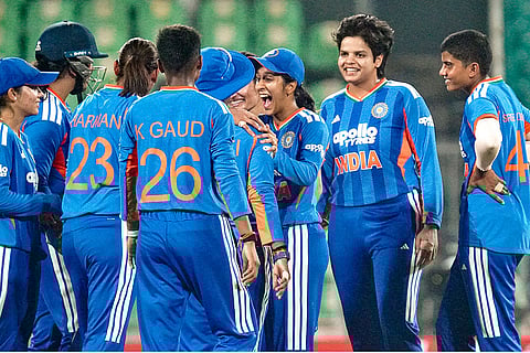 India’s players celebrate a wicket during the third T20 International cricket match of a series between India Women and Sri Lanka Women, at Greenfield International Stadium, in Thiruvananthapuram.