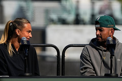 Tennis players Aryna Sabalenka of Belarus, left, and Nick Kyrgios of Australia speak during a press conference ahead of the Battle of the Sexes exhibition match at Atlantis The Royal in Dubai, United Arab Emirates.