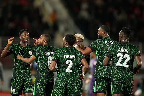 Nigeria's players celebrate a goal scored by their teammate Victor Osimhen during the Africa Cup of Nations group C soccer match between Nigeria and Tunisia in Fez, Morocco.