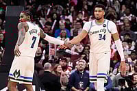 NBA: Antetokounmpo Stars On Return As Bucks Snap Bulls' Five-Game Winning Streak | Photo: AP/Nam Y. Huh : Milwaukee Bucks forward Giannis Antetokounmpo, right, celebrates with guard Kevin Porter Jr.. left, during the second half of an NBA basketball game against the Chicago Bulls in Chicago.