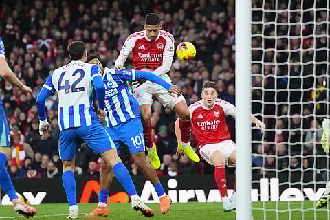 Arsenal's William Saliba fails to score during the English Premier League soccer match between Arsenal and Brighton and Hove Albion in London.