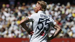 | Photo: AP/Hamish Blair : England's Ben Stokes pauses before bowling a delivery to Australia on Day 2 of their Ashes cricket test match in Melbourne, Saturday, Dec. 27, 2025.